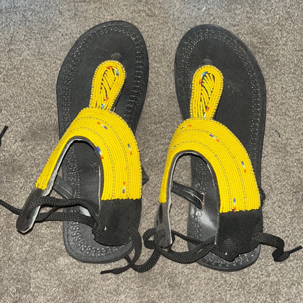Black & yellow flat sandals